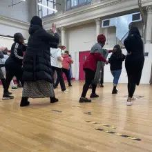 Connecting through theatre 1 Group of women in a movement workshop