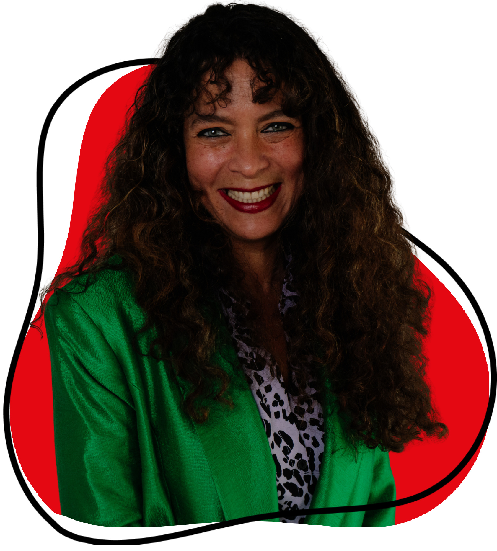 Smiling woman with long curly hair wearing a bright green blazer and a patterned blouse, standing in front of a red abstract background with black outlines.